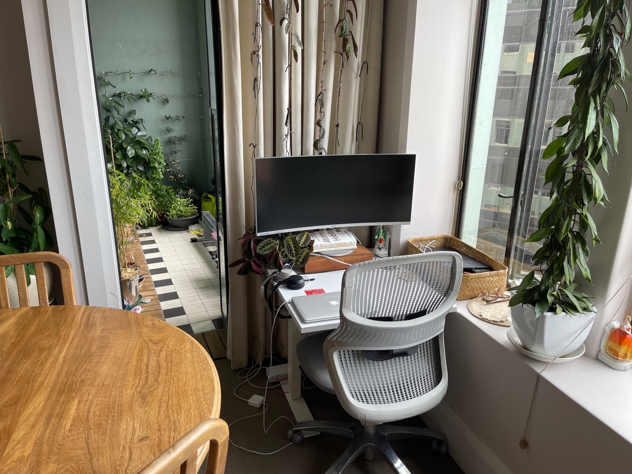 Hannah's desk is small and in the corner, where she likes it.